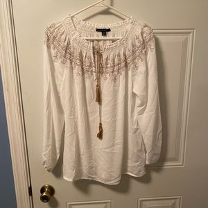 White and gold shirt